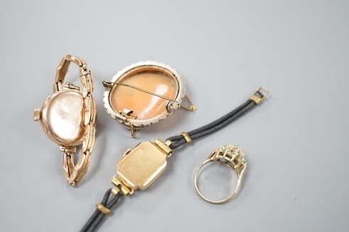 A lady's early 20th century 9ct gold manual wind wrist watch, on a 9ct strap, gross 16.4 grams, a lady's 18k watch, gross 9.9 grams, a cameo brooch and a 9ct dress ring.